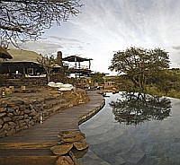 Enjoy the riverine setting at Singita Faru Faru Lodge